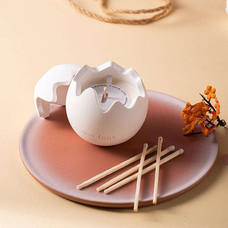 AIKUN Custom Logo Home Decorative Soy Wax Egg Shaped Candle Essential Oils Eggshell Ceramic Cup Scented Candles